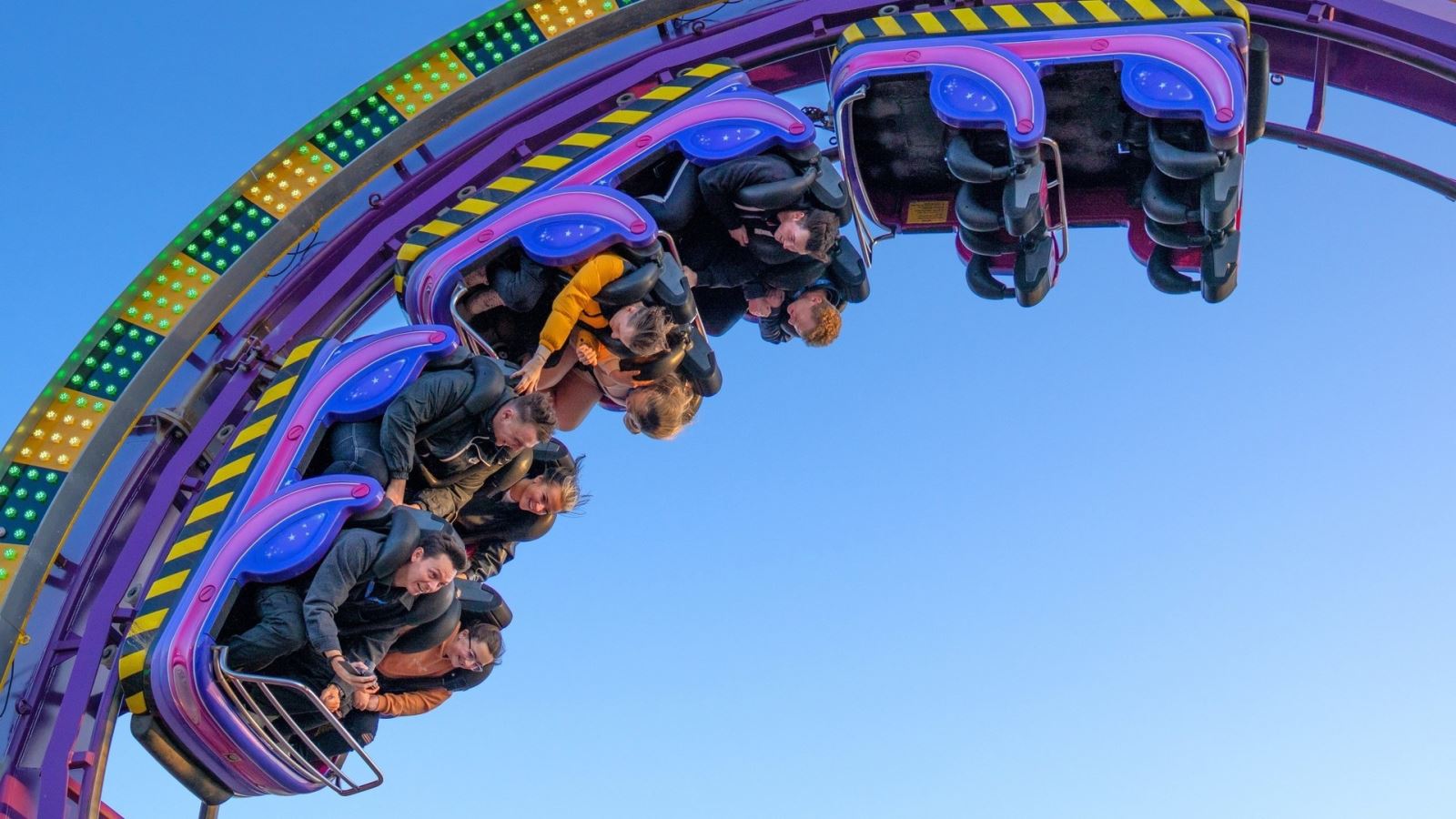 People on a rollercoaster at Clacton Pier, Essex